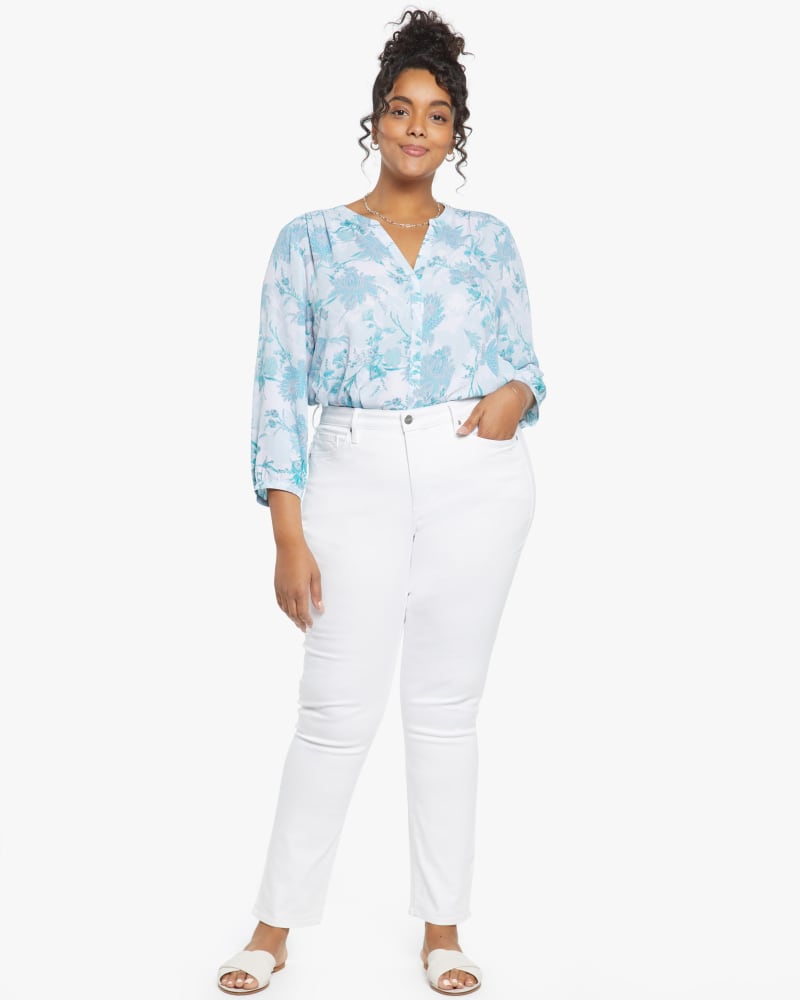 Front of a model wearing a size 14W Sheri Crop Jean in Optic White by NYDJ. | dia_product_style_image_id:187652